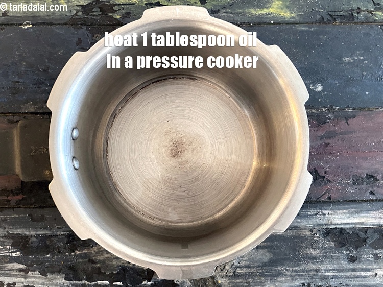 Step 13 – Heat 1 tbsp of oil in a pressure cooker.