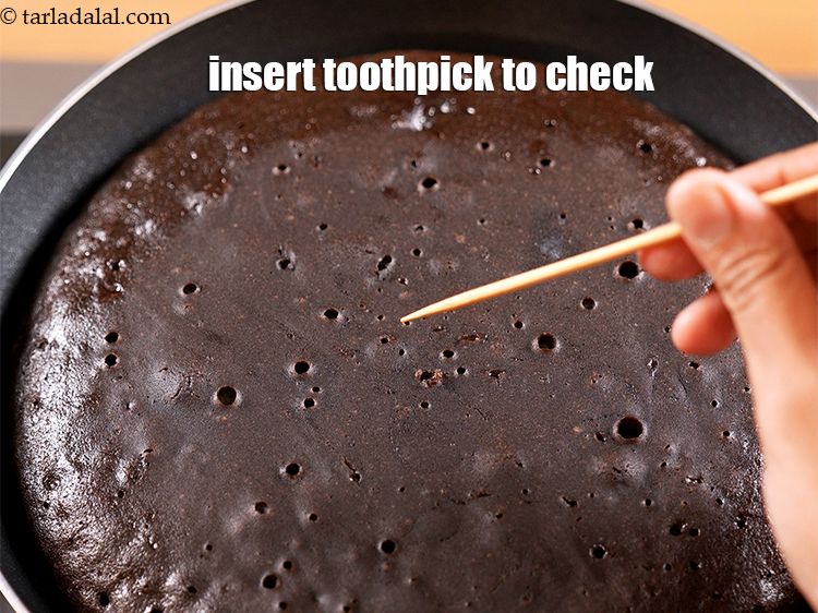 Step 11 – Insert a toothpick to check the cake is cooked completely.<br /> &nbsp;