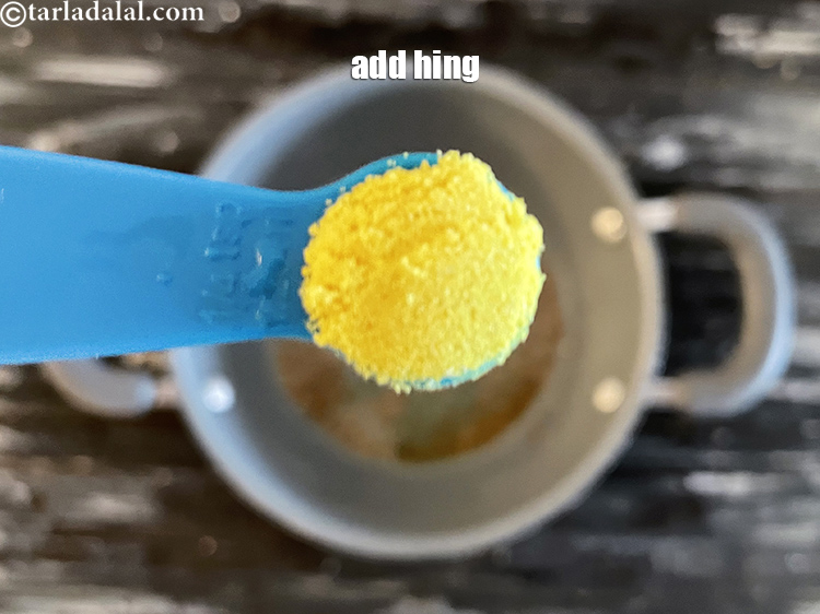 Step 18 – Add&nbsp;<meta charset="UTF-8" />1/4 tsp&nbsp;<a href="glossary-asafoetida-hing-113i">asafoetida (hing)</a>.