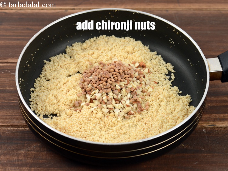 Step 13 – Add 1 1/2 tbsp <a href="https://www.tarladalal.com/glossary-chirongi-nuts-charoli-piyal-seeds-305i">chirongi nuts (charoli)</a>.
