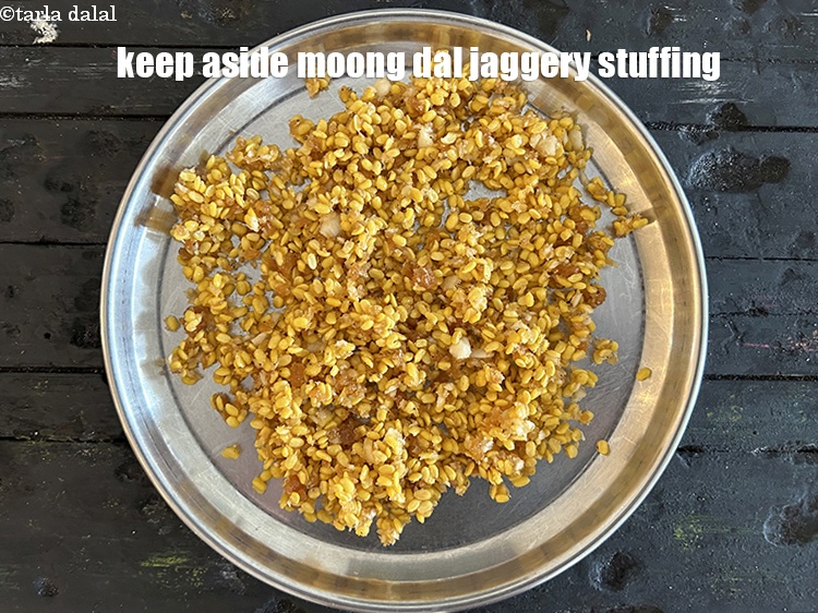 Step 12 – Keep aside moong dal jaggery stuffing&nbsp;.