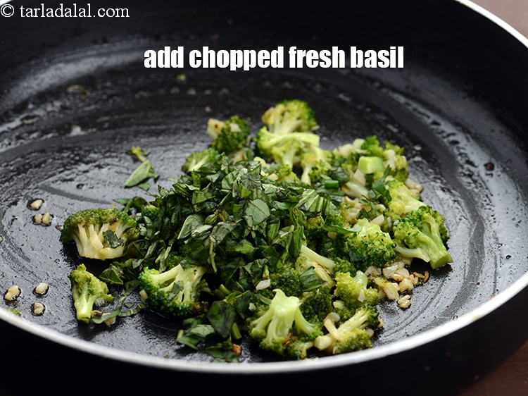 Step 11 – Add 2 tbsp chopped fresh&nbsp;<a href="https://www.tarladalal.com/glossary-basil-185i">basil</a>.