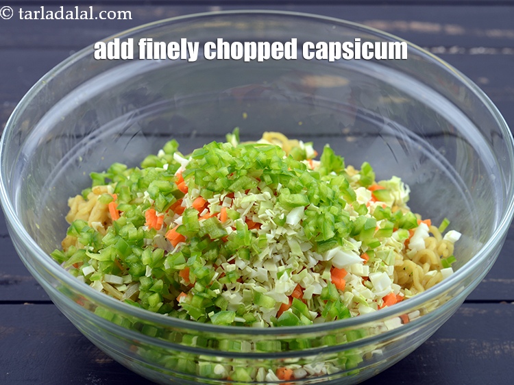 Step 12 – Add 1/4 cup&nbsp;finely&nbsp;<a href="https://www.tarladalal.com/glossary-chopped-capsicum-164i">chopped capsicum</a>.