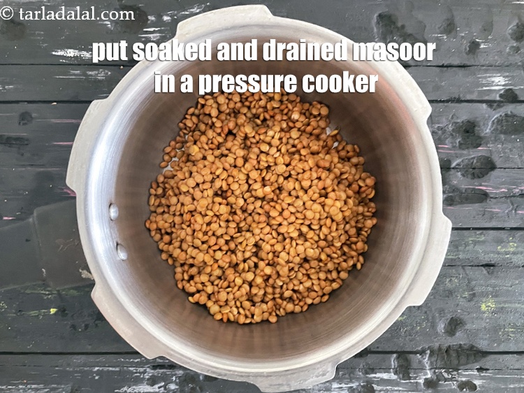Step 19 – In a pressure cooker put&nbsp;<meta charset="UTF-8" />3/4 cup&nbsp;<a href="glossary-masoor-whole-red-lentil-kala-masoor-301i">masoor (whole red lentil)</a>&nbsp;, soaked overnight and …