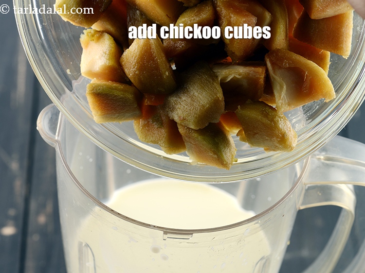 Step 11 – Add 2 cups <a href="https://www.tarladalal.com/glossary-chickoo-cubes-738i">chickoo cubes</a>.