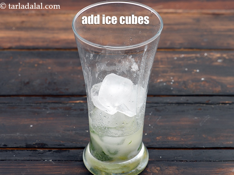 Step 11 – Add 6 <a href="https://www.tarladalal.com/glossary-ice-476i">ice</a>&nbsp;cubes.