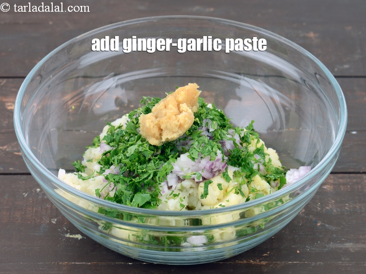 Step 12 – Add 2 tsp&nbsp;<a href="https://www.tarladalal.com/glossary-ginger-garlic-paste-adrak-lehsun-ki-pate-adrak-lahsun-ki-paste-939i">ginger-garlic (adrak-lehsun) paste</a>.