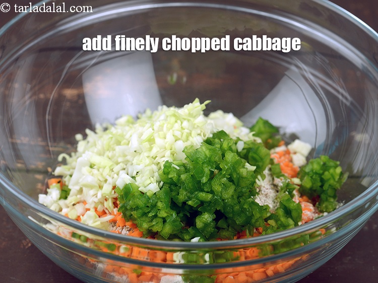 Step 11 – Add 1/4 cup&nbsp;finely&nbsp;<a href="https://www.tarladalal.com/glossary-chopped-cabbage-781i">chopped cabbage</a>.&nbsp;