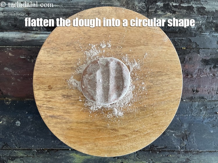 Step 16 – Flatten the dough into a circular shape.