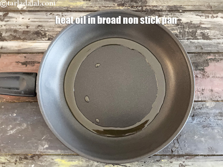 Step 11 – Heat 1 tbls&nbsp;oil in a broad non-stick pan.