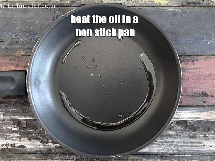 Step 13 – Heat 1 tsp oil in a broad non-stick pan.