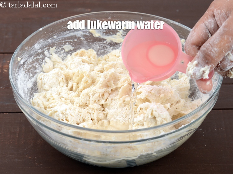 Step 11 – Add 1/4&nbsp;cup luke warm water.