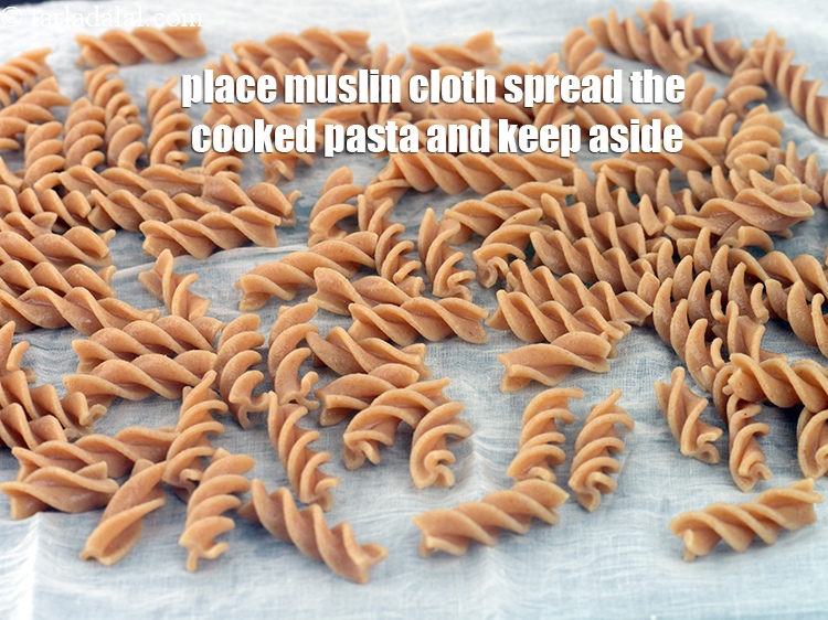 Step 11 – Place a muslin cloth on a clean, dry surface, spread the cooked pasta over it, …