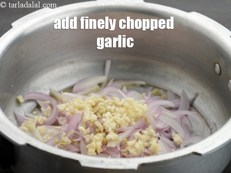 Step 14 – Add 1 1/2 tbsp&nbsp;finely&nbsp;<a href="https://www.tarladalal.com/glossary-chopped-garlic-790i">chopped garlic (lehsun)</a>.