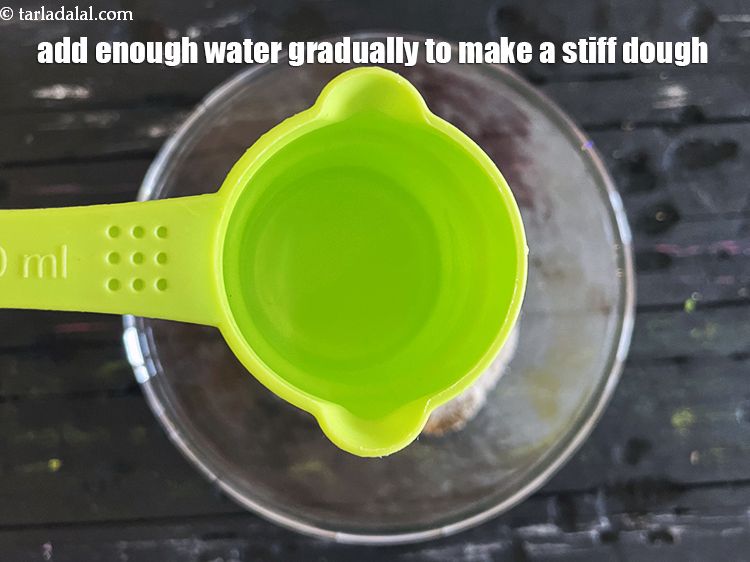 Step 12 – Add enough water gradually&nbsp;to make a stiff dough. We added 1/4 cup&nbsp;water and then added …
