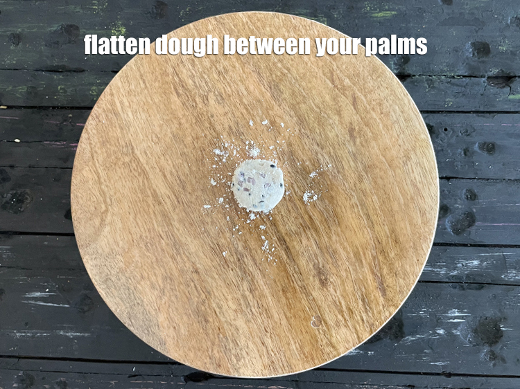 Step 12 – <p>Dust a rolling board with jowar flour and flatten the dough between your palms.</p>