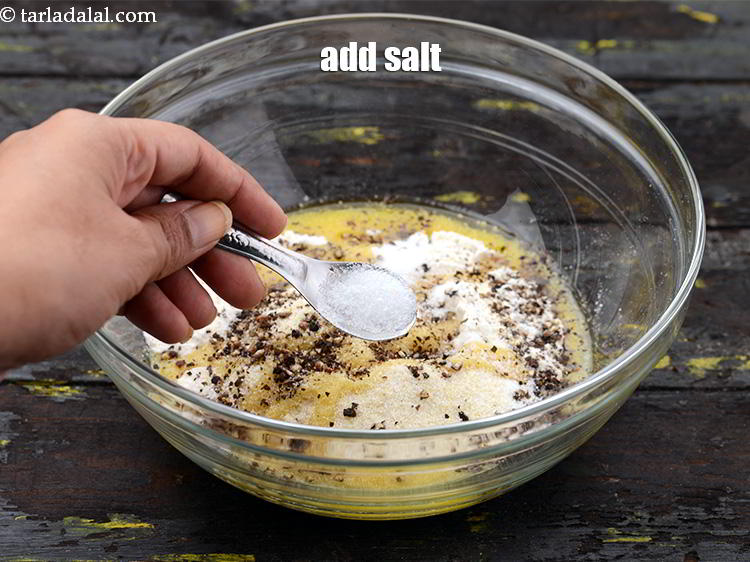 Step 13 – Add the <a href="https://www.tarladalal.com/glossary-salt-namak-table-salt-418i" target="_blank">salt</a>.