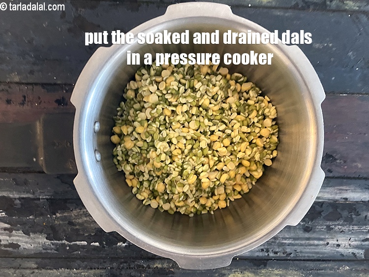 Step 11 – In a pressure cooker put the soaked dals.