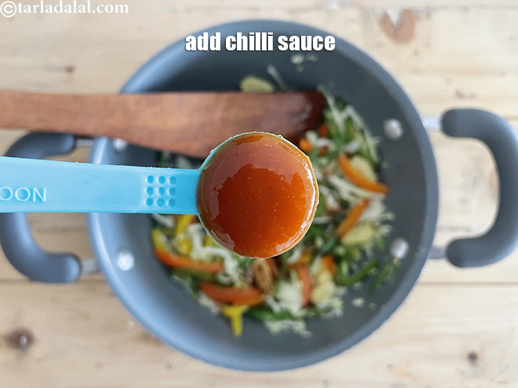 Step 15 – Add&nbsp;<meta charset="UTF-8" />1 tbsp&nbsp;<a href="glossary-red-chilli-sauce-lal-chilli-sauce-810i">chilli sauce</a>.