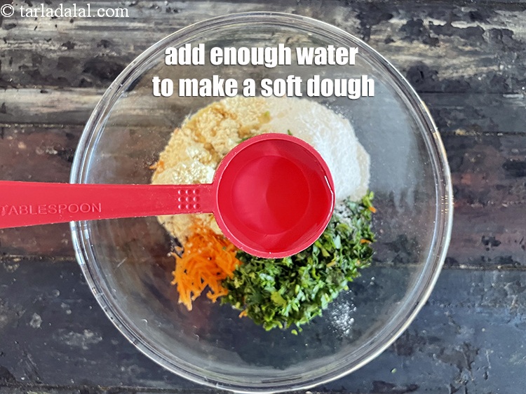 Step 11 – Add enough water to make a soft dough. We added 1 1/2&nbsp;tablespoon&nbsp;water.&nbsp;