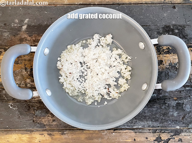 Step 11 – Add&nbsp;<meta charset="UTF-8" />3/4 cup&nbsp;grated fresh&nbsp;<a href="glossary-coconut-nariyal-269i">coconut</a>.