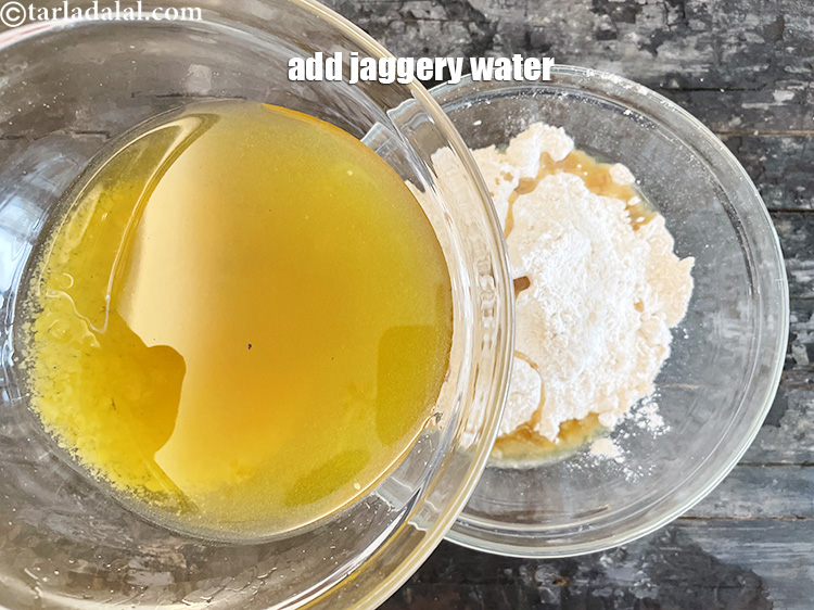 Step 11 – <p>Add jaggery water. Step by step on preparing jaggery water given above.</p>
