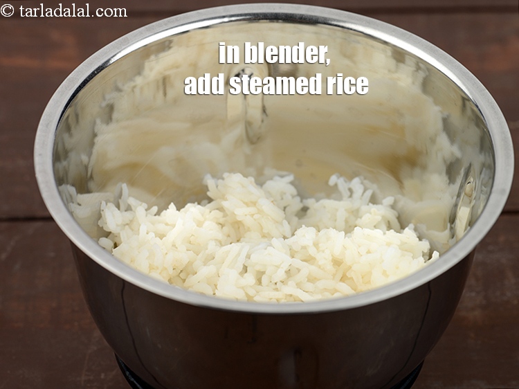 Step 11 – In a blender, add 5 tbsp&nbsp;<a href="https://www.tarladalal.com/steamed-rice-4800r">steamed rice</a>.