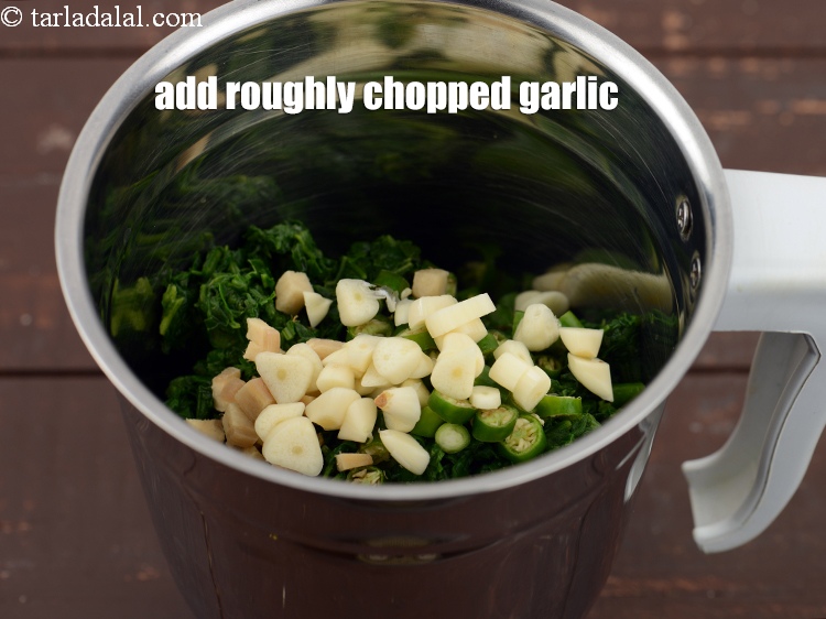 Step 11 – Add 1 tsp roughly <a href="https://www.tarladalal.com/glossary-chopped-garlic-790i">chopped garlic (lehsun)</a>.