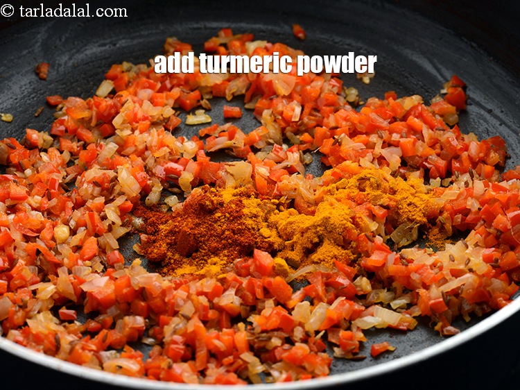 Step 11 – Add &frac14; tsp <a href="https://www.tarladalal.com/glossary-turmeric-powder-haldi-645i">turmeric powder (haldi)</a>.
