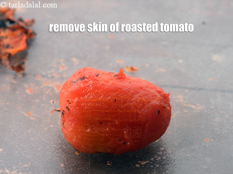 Step 11 – Remove the skin of the roasted tomato.