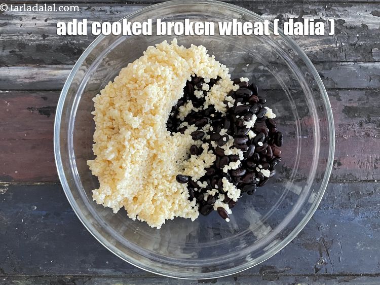 Step 32 – Add&nbsp;1 cup&nbsp;<a href="glossary-cooked-broken-wheat-dalia-2168i">cooked broken wheat (dalia)</a>. <u><em>See above on how to cook dalia, borken wheat …