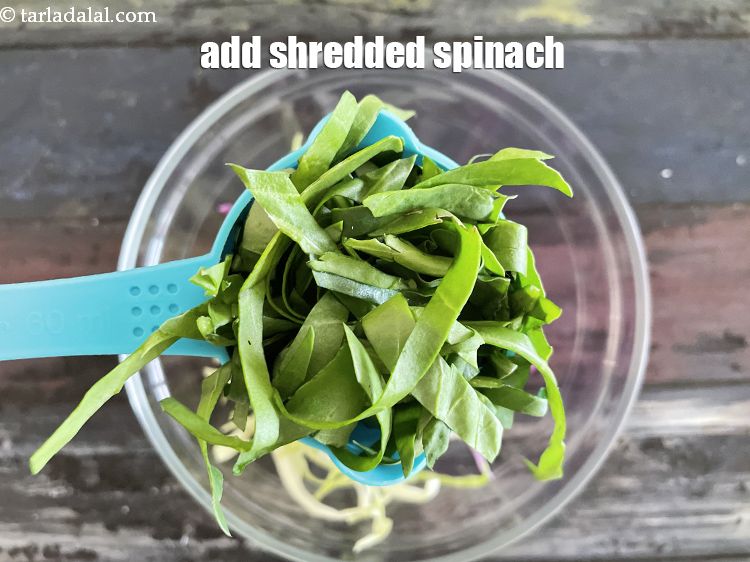 Step 14 – Add&nbsp;1/2 cup&nbsp;<a href="glossary-shredded-spinach-777i">shredded spinach (palak)</a>.