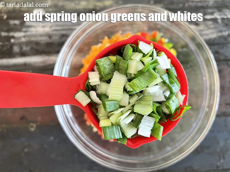 Step 19 – Add&nbsp;<meta charset="UTF-8" />1/4 cup&nbsp;<a href="glossary-chopped-spring-onion-greens-1030i">chopped spring onion greens</a>&nbsp;and whites.