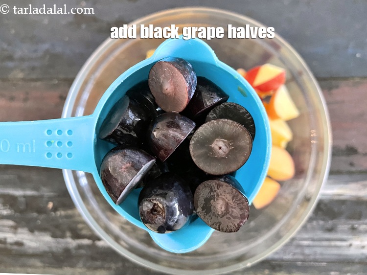 Step 24 – Add&nbsp;<meta charset="UTF-8" />1/2 cup&nbsp;<a href="glossary-black-grape-halves-2613i">black grape halves</a>.