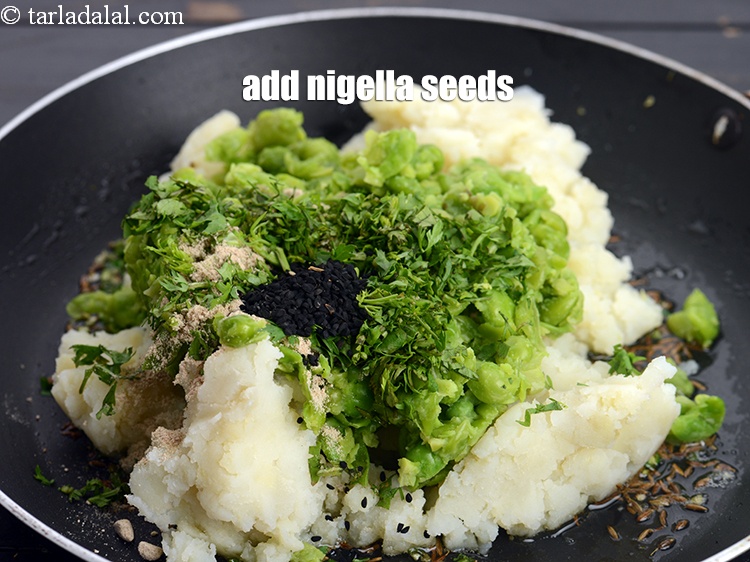 Step 12 – Add 1/2 tsp&nbsp;<a href="https://www.tarladalal.com/glossary-nigella-seeds-kalonji-onion-seeds-552i">nigella seeds (kalonji)</a>.