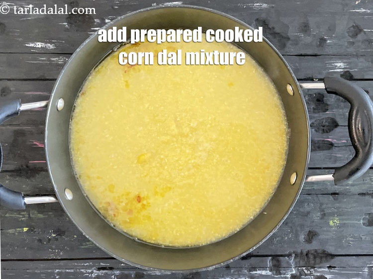Step 12 – Add the prepared corn-moong dal mixture.