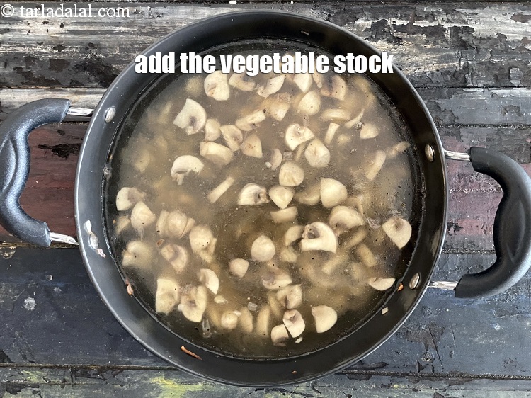 Step 25 – Add the vegetable stock.
