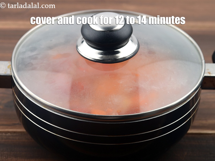 Step 11 – Cover with a lid and cook on a medium flame for 12 to 14 minutes, …