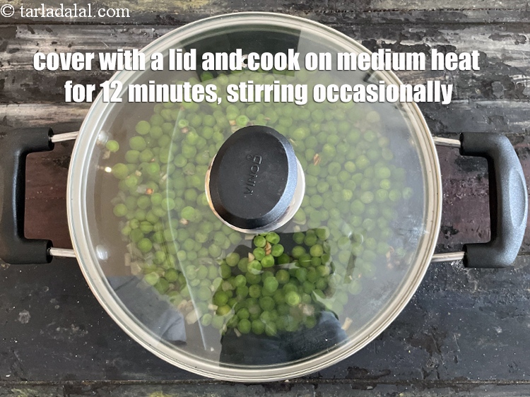 Step 12 – Cover it with a lid and cook on a medium flame for 12 minutes, while …