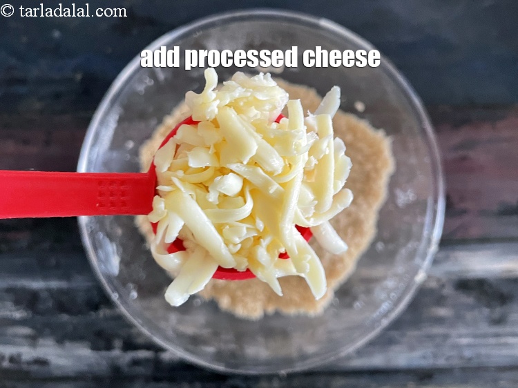 Step 11 – Add&nbsp;<meta charset="UTF-8" />4 tbsp&nbsp;<a href="glossary-grated-processed-cheese-868i">grated processed cheese</a>.