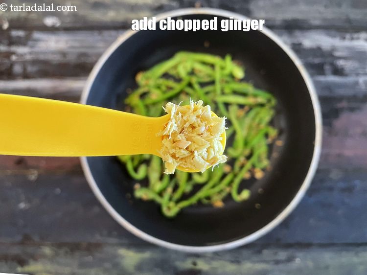 Step 18 – Add&nbsp;<meta charset="UTF-8" />1/2 tsp&nbsp;<a href="glossary-chopped-ginger-786i">chopped ginger (adrak)</a>.