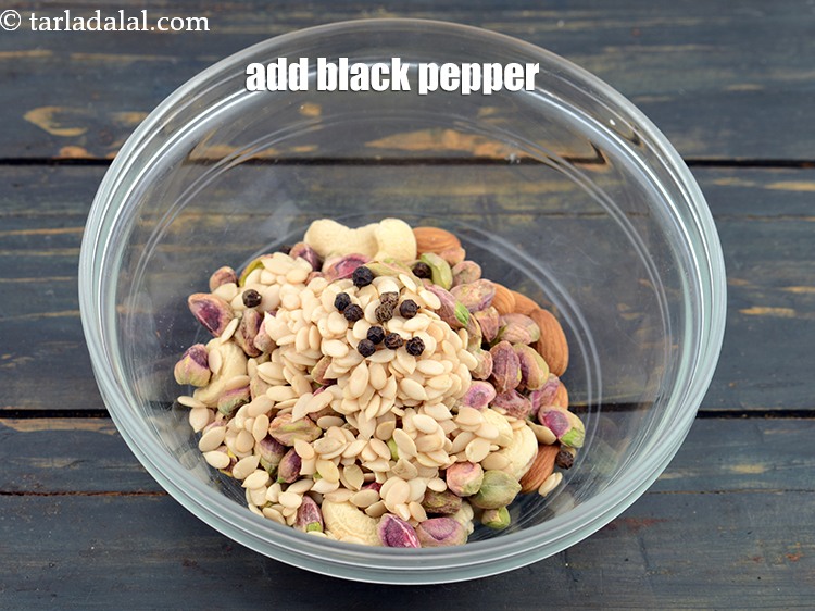 Step 11 – Add 10&nbsp;whole&nbsp;<a href="https://www.tarladalal.com/glossary-black-peppercorns-kali-mirch-kalimirch-566i">black peppercorns (kalimirch)</a>.&nbsp;