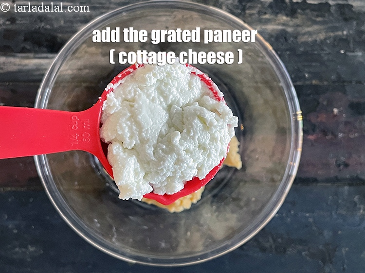 Step 18 – Add&nbsp;<meta charset="UTF-8" />1/4 cup&nbsp;<a href="glossary-grated-low-fat-paneer-1118i">grated low fat paneer (cottage cheese)</a>.