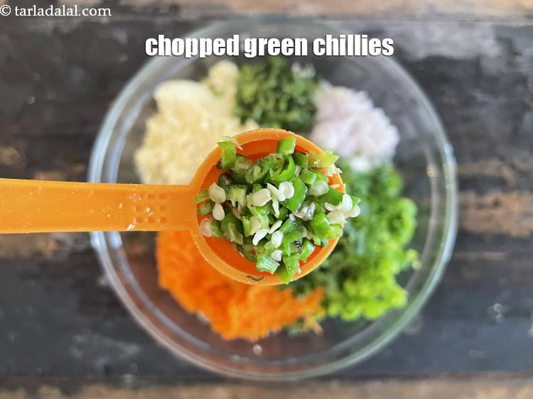 Step 16 – Add&nbsp;<meta charset="UTF-8" />2 tsp&nbsp;finely&nbsp;<a href="glossary-chopped-green-chilli-820i">chopped green chillies</a>.