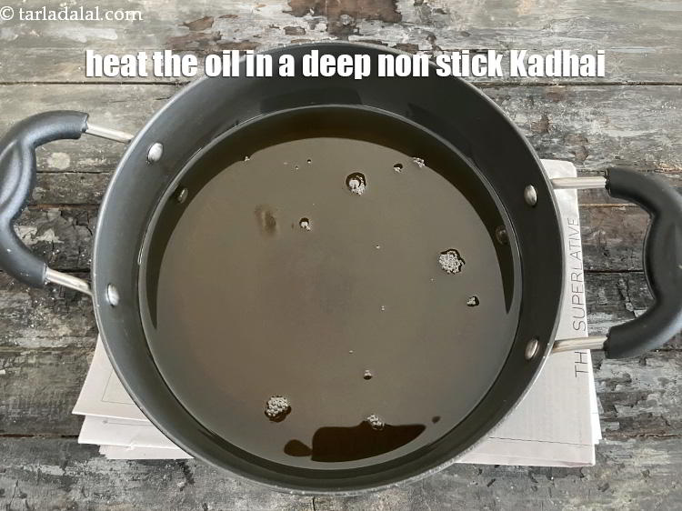 Step 17 – Heat the oil in a deep non-stick kadhai.