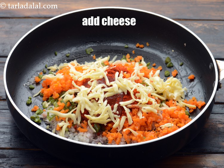 Step 11 – Add 1/4 cup&nbsp;<a href="https://www.tarladalal.com/glossary-grated-processed-cheese-868i">grated processed cheese</a>.&nbsp;