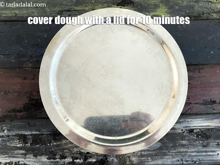 Step 11 – Cover the dough with a lid and keep aside for 10 minutes.