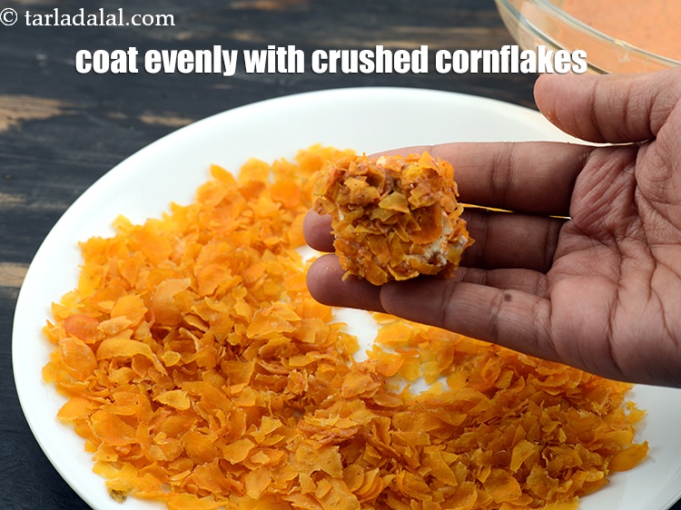 Step 16 – Coat evenly with crushed cornflakes.