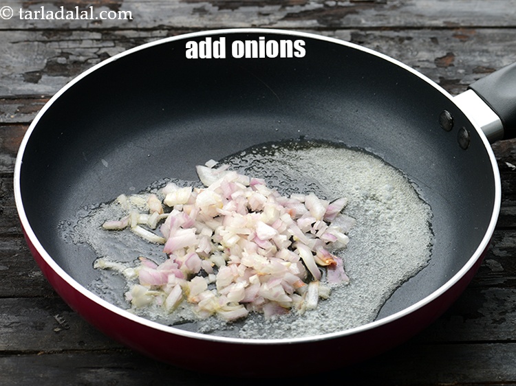 Step 13 – Add 1/4 cup&nbsp;finely&nbsp;<a href="https://www.tarladalal.com/glossary-chopped-onions-722i">chopped onions</a>.&nbsp;