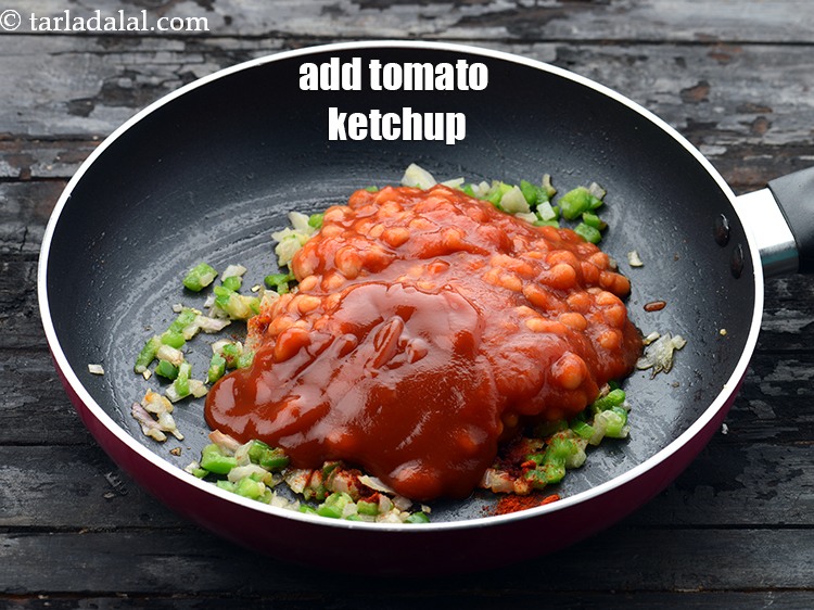 Step 20 – Add 2 tbsp&nbsp;<a href="https://www.tarladalal.com/glossary-tomato-ketchup-tomato-sauce-181i">tomato ketchup</a>.&nbsp;